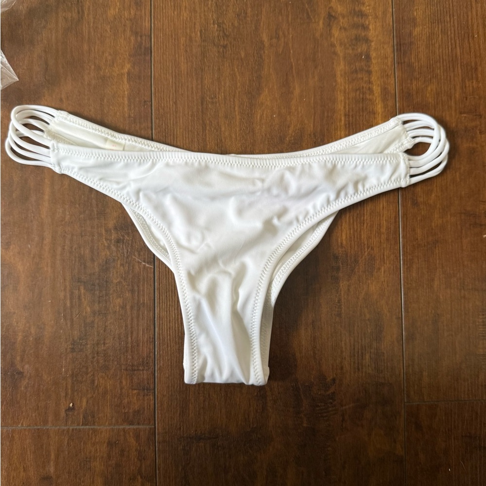 Brand new! Victoria’s Secret White Strappy Bikini Bottom
